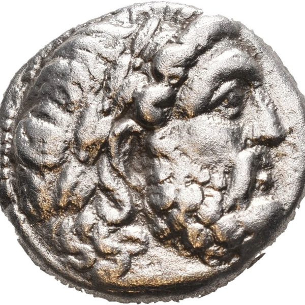 Ancient Greece, SELEUKID EMPIRE. Seleukos I Nikator, 312-281 BC. AR tetradrachm (14,55 g; 24.5 mm). Seleukeia on the Tigris II mint, struck circa 296-281 BC. Laureate head of Zeus right / BAΣIΛEΩΣ ΣEΛEYKOY, Athena advancing right in quadriga pulled by four horned elephants, brandishing spear and shield; anchor in upper right field; unclear controls/monograms in fields, SC 130; HGC 9, 18a; kv. 1+-1. Crystallized grainy surfaces. Brightly cleaned.